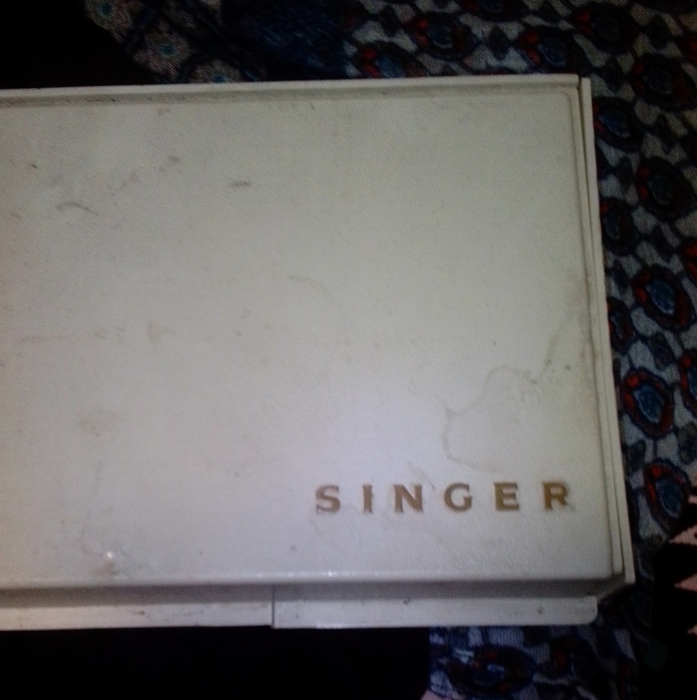 Singer handheld sewing machine